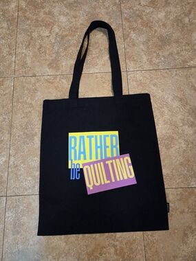 Black Canvas Tote with Colorful 'Rather Be Quilting' Graphic